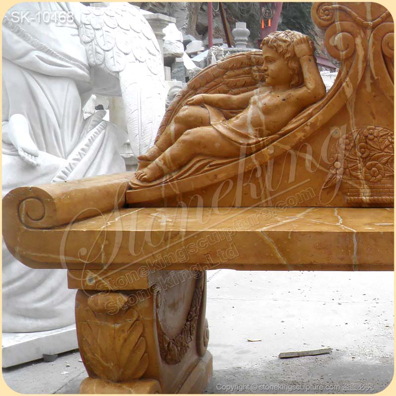 Factory Supply Hand Carved Yellow Marble Outdoor Decorative Garden Bench with Angels for sale