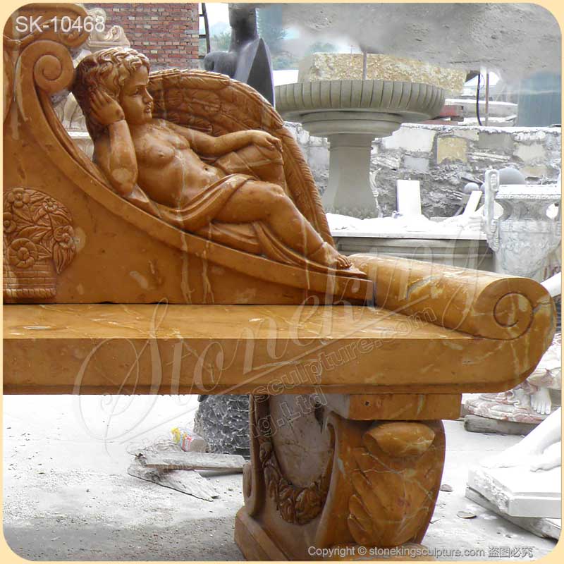 Factory Supply Hand Carved Yellow Marble Outdoor Decorative Garden Bench with Angels for sale