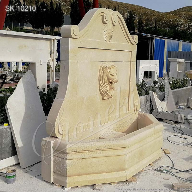 Factory Supplier Egyptian Beige Marble Outdoor Lion Head Wall Fountain for sale 