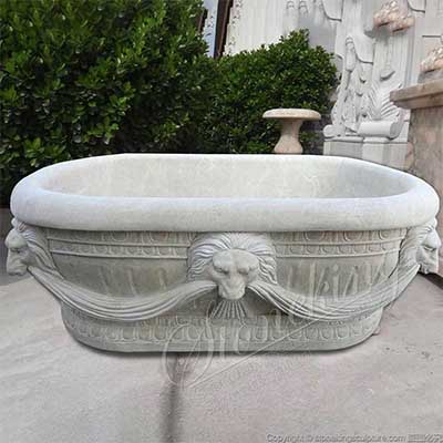 Wholesale Hand Carved Freestanding Oval Natural Stone Bathtub with Lion Head for sale 